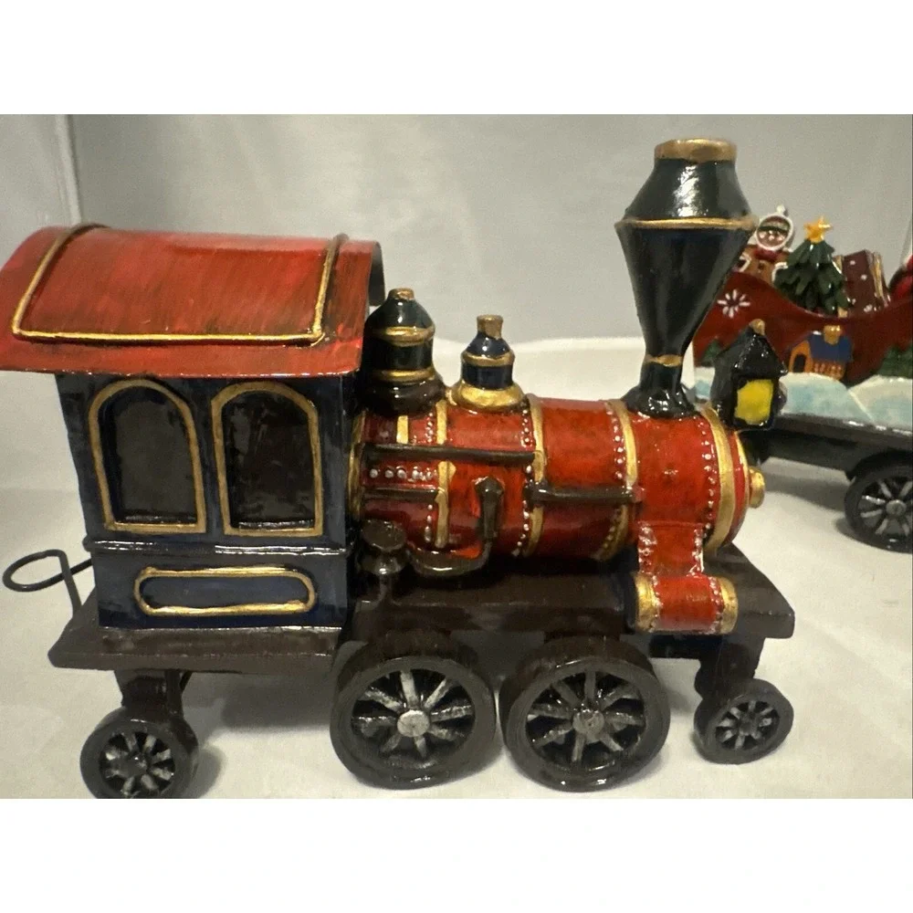 Sterling 3 Piece Resin  Santa,‎ Snowman and Tree Christmas Train Set.
